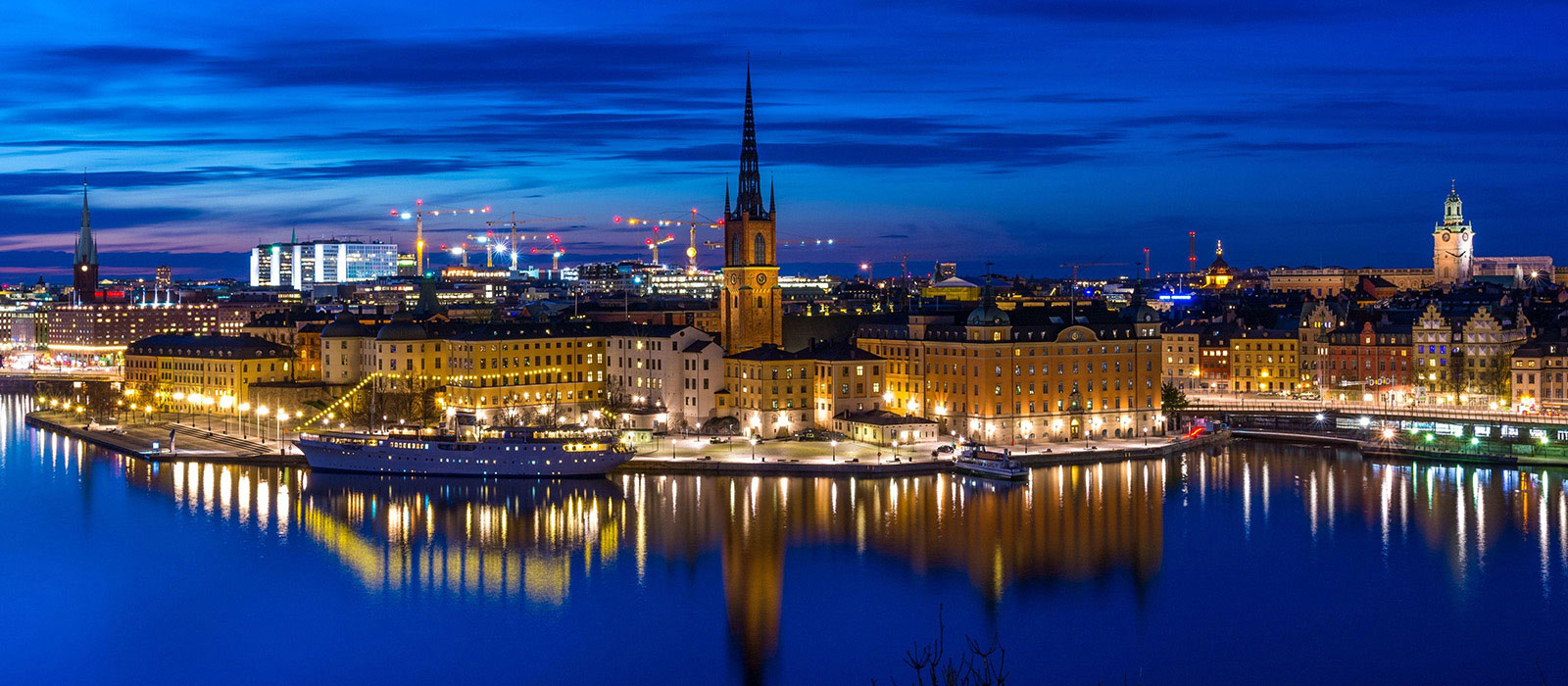 Night view over Stockholm King's Palace in foreground